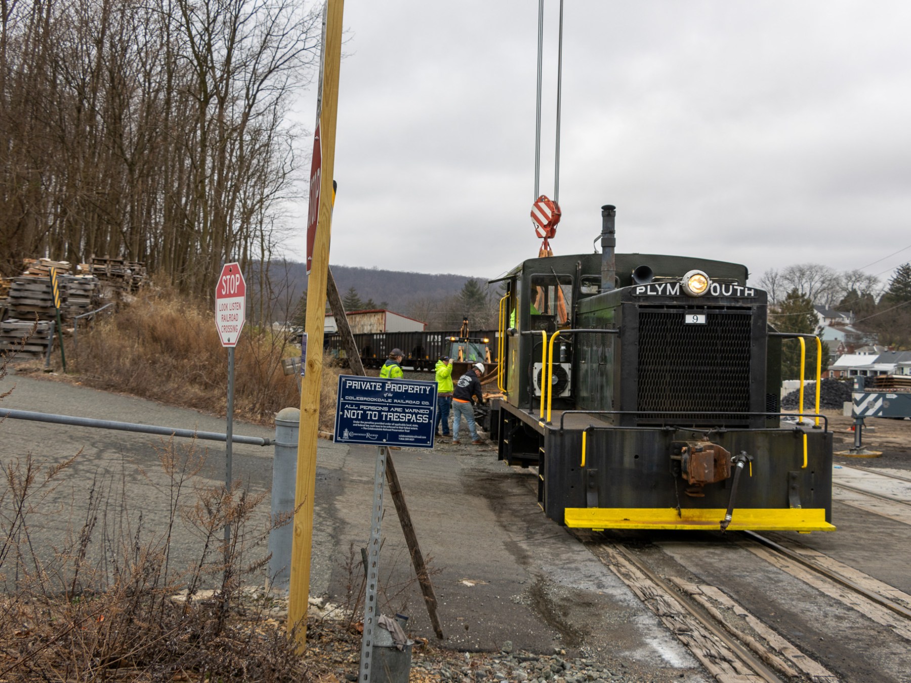 a train is parked on the side of a road
