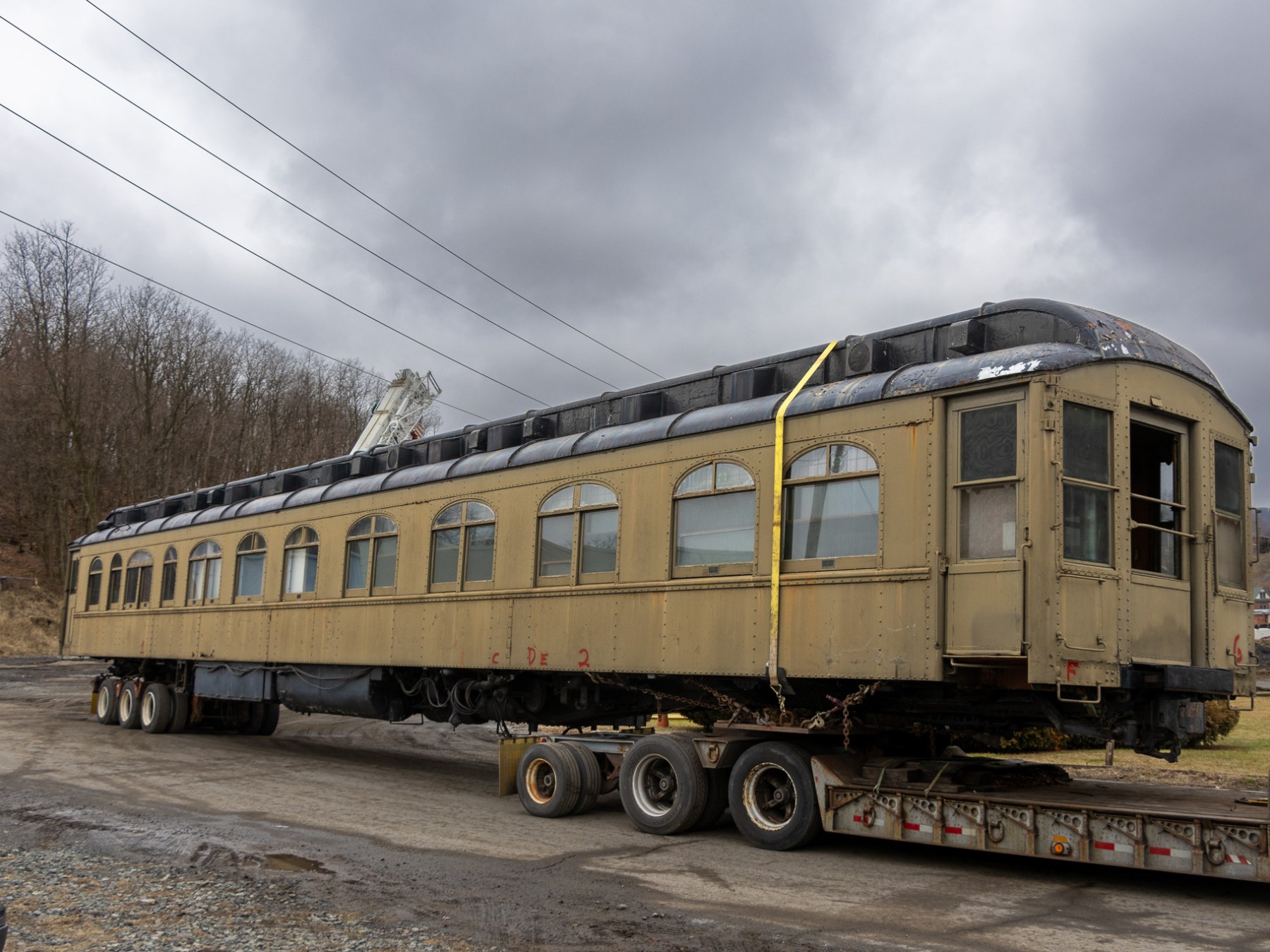 a train is parked on the side of a truck