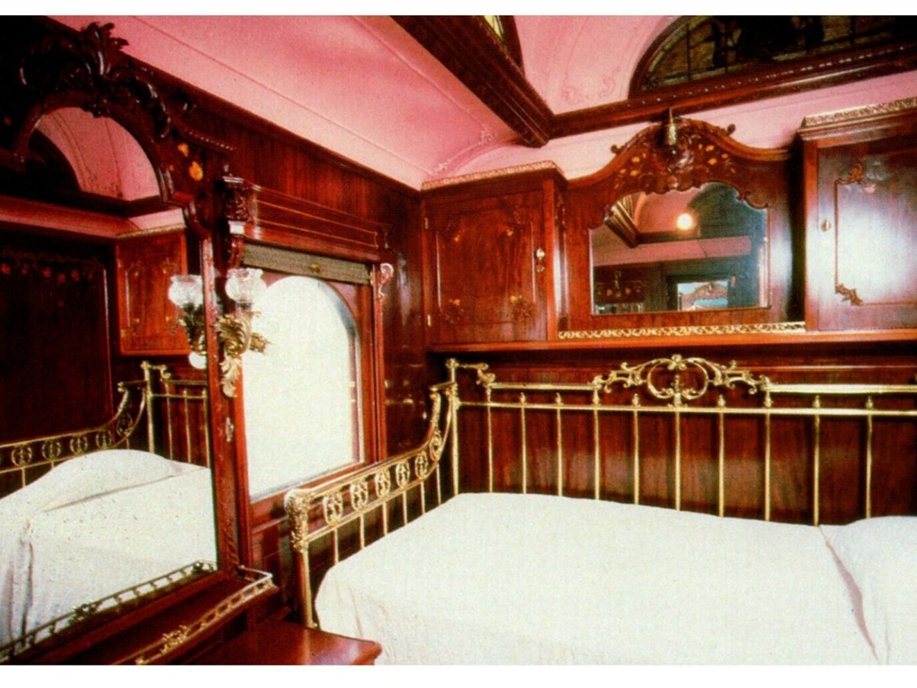 a kitchen with wooden cabinets and a fireplace