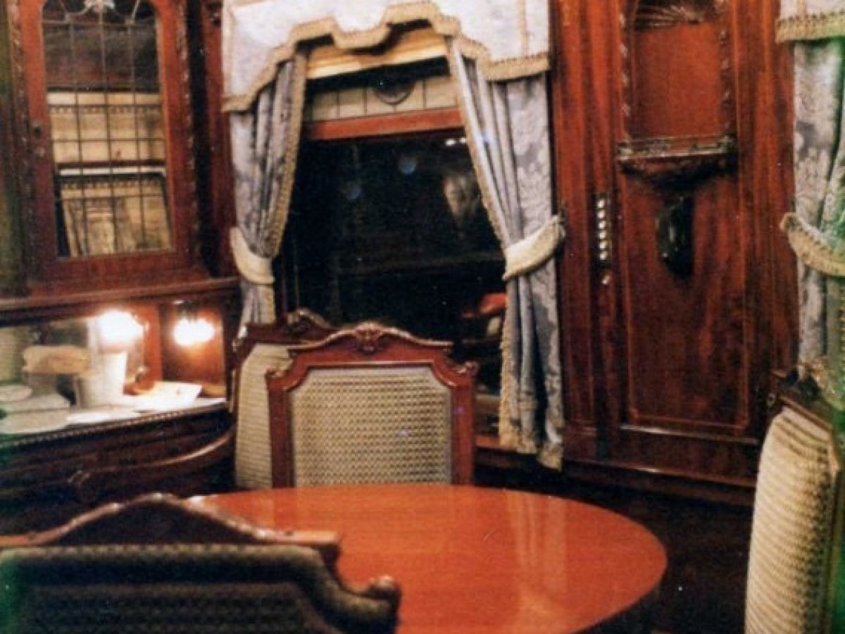 a room filled with furniture and a fireplace