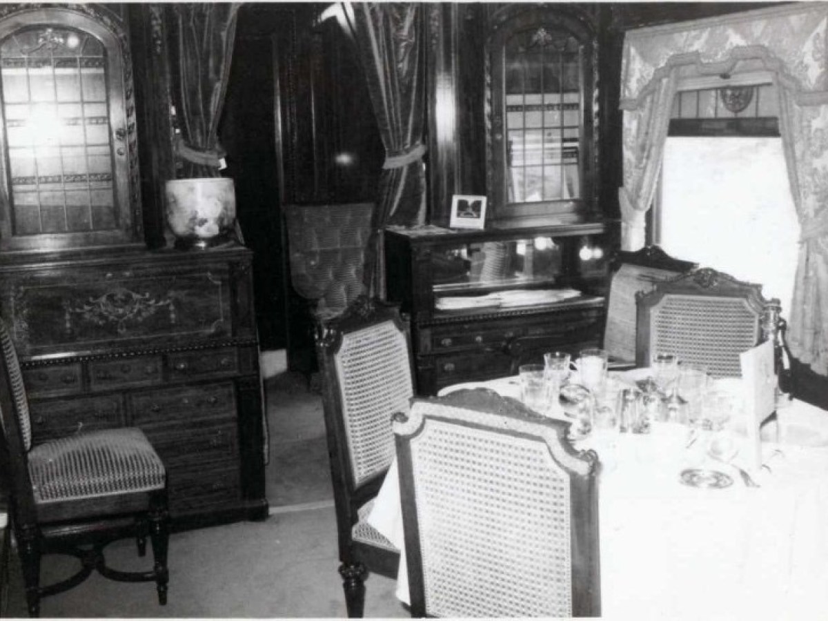 a living room filled with furniture and a window
