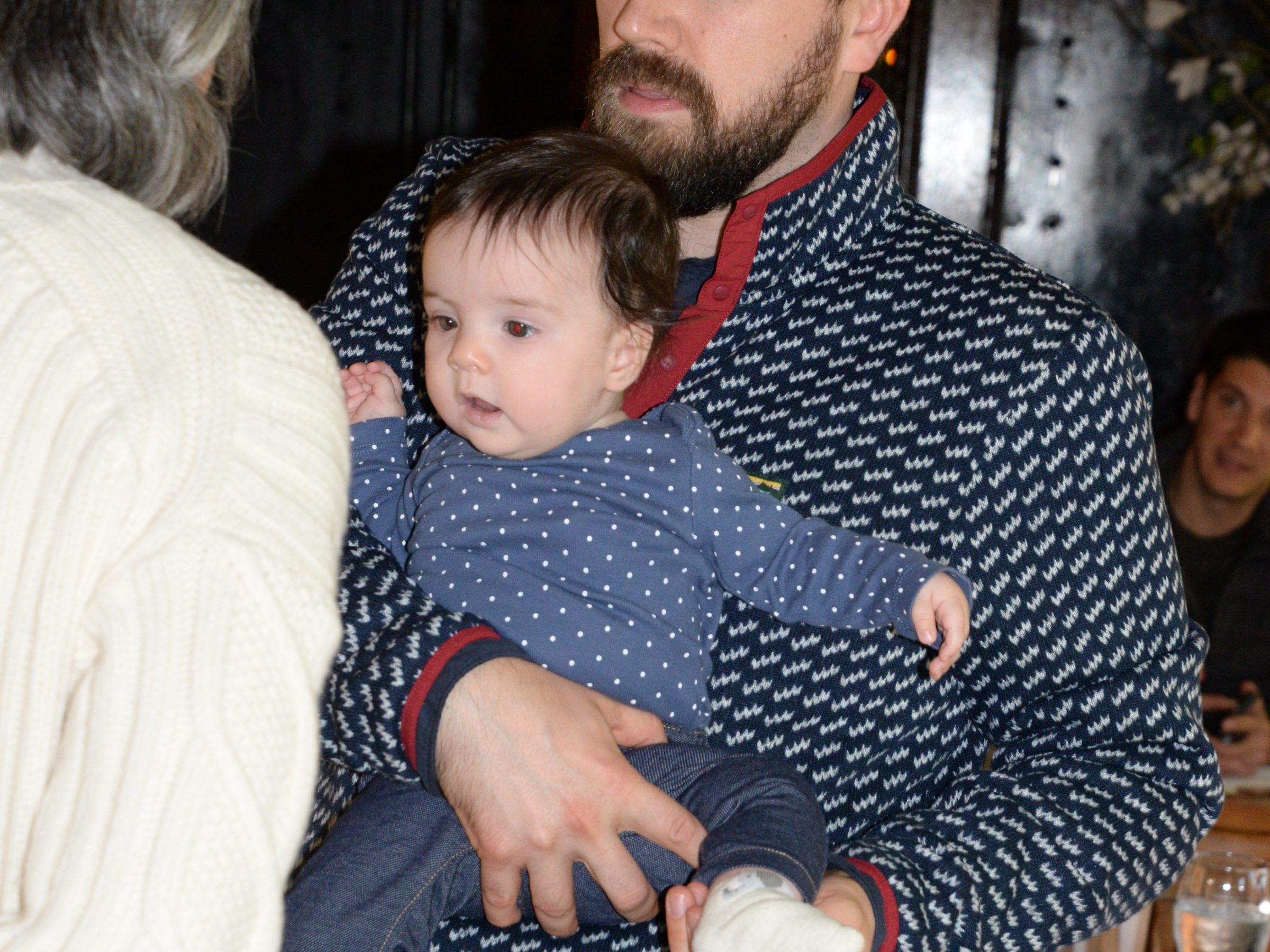 a group of people sitting at a table