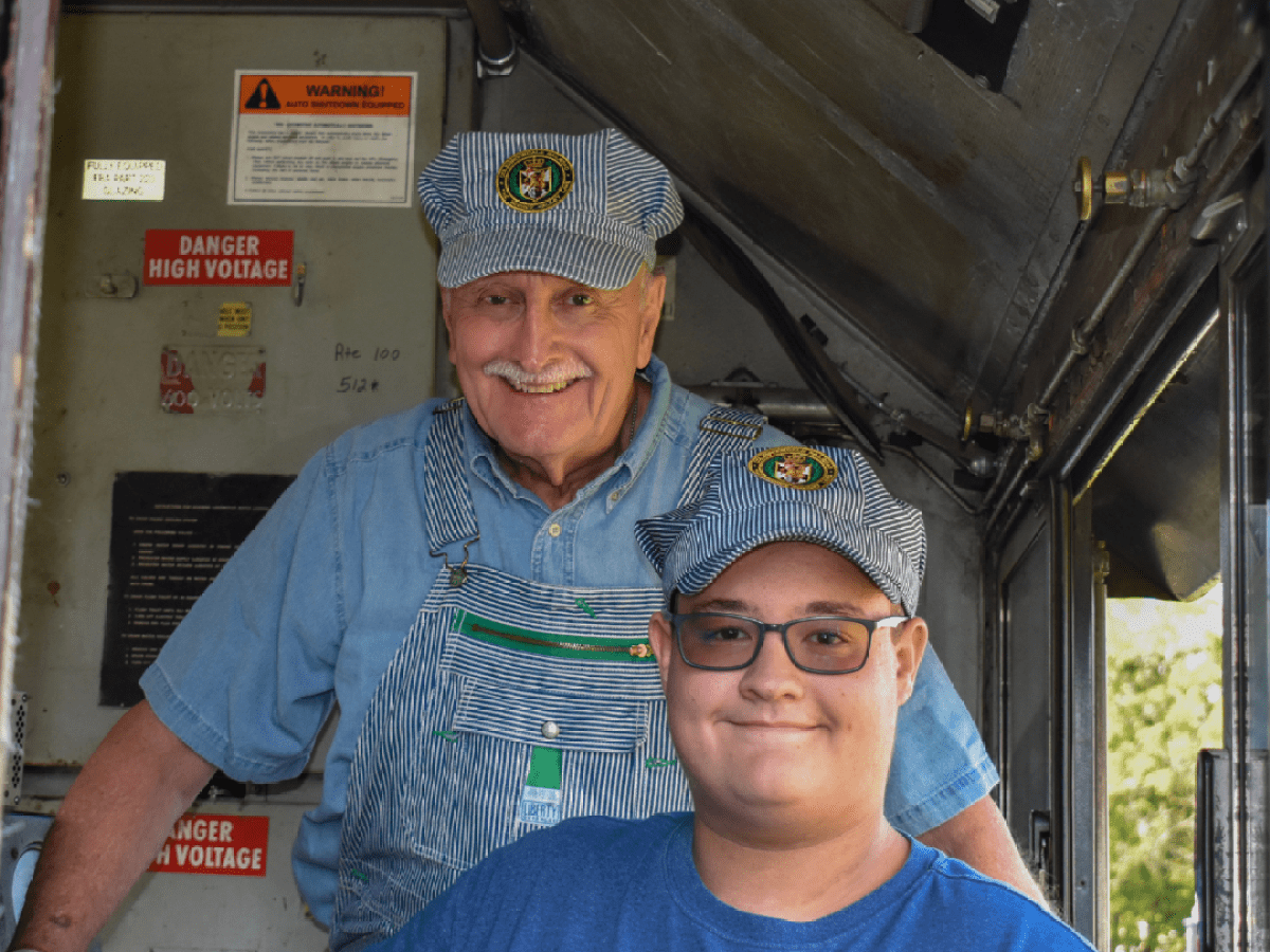 a man standing in front of a building