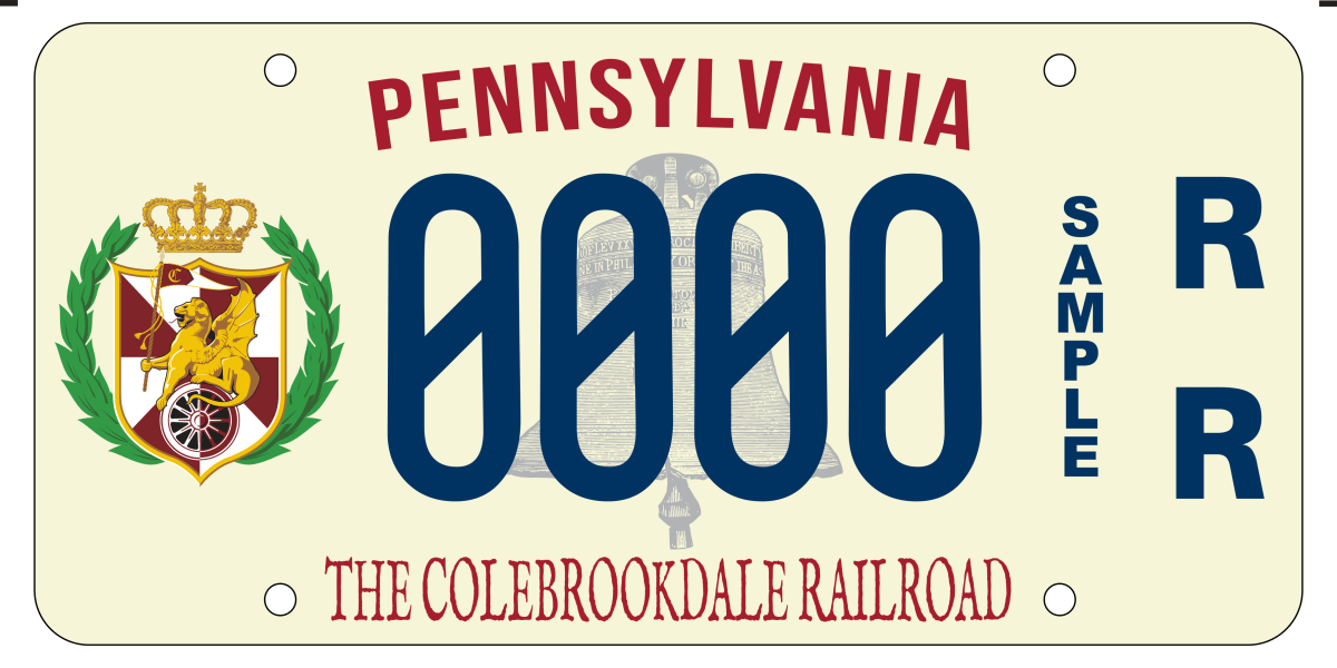 Pennsylvania license plate with 0000, heraldic emblem, RR symbols; text: 'The Colebrookdale Railroad'.