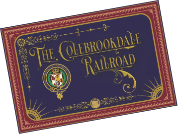Ornate sign for The Colebrookdale Railroad on a dark blue background.